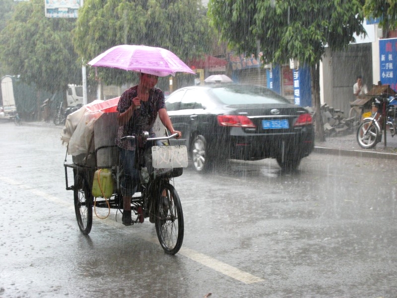Jinghong, Yunnan, China: Tropischer Regen